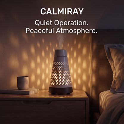 Close-up of CALMIRAY diffuser natural wood base and perforated ceramic