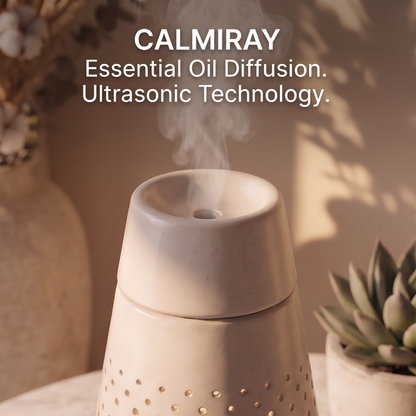 CALMIRAY ultrasonic essential oil diffuser in hand-crafted ceramic with natural wood base on marble table