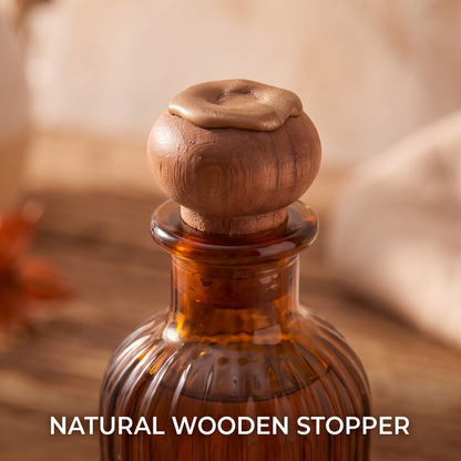 Eco-friendly amber glass bottle of CALMIRAY Relax & Unwind essential oil blend